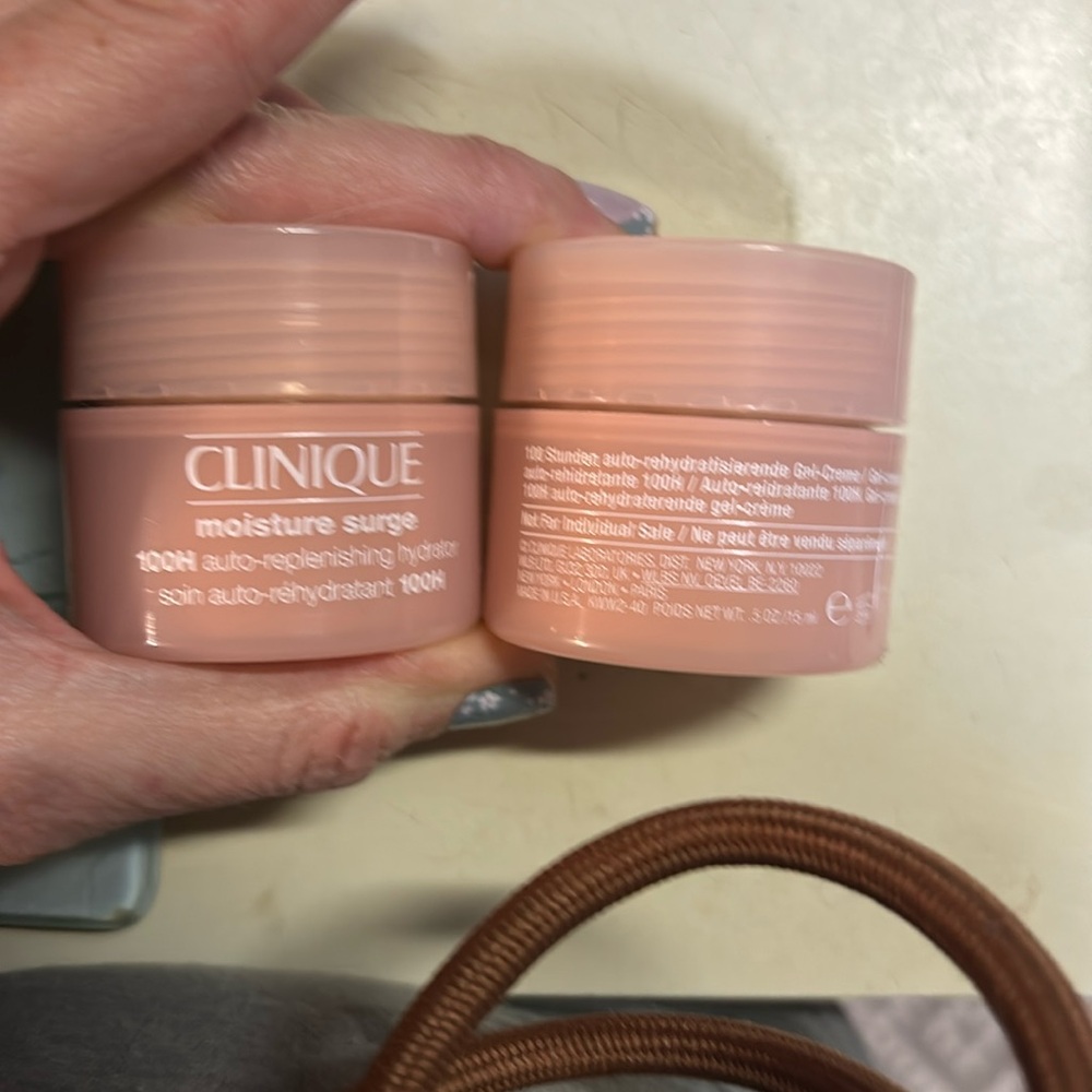 Set of two brand new never used Clinique moisture surge .5oz each